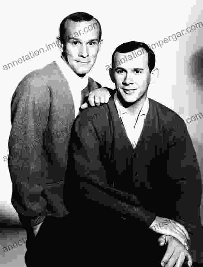 A Black And White Photo Of The Smothers Brothers, Tommy And Dick, In Their Signature Suits And Ties. Dangerously Funny: The Uncensored Story Of The Smothers Brothers Comedy Hour