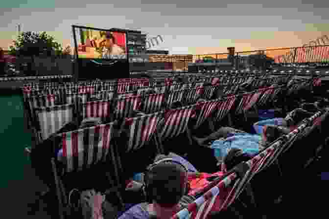 A Group Of People Watching A Film Screening At The World Fair, Their Faces Illuminated By The Screen Projecting America 1958: Film And Cultural Diplomacy At The Brussels World S Fair