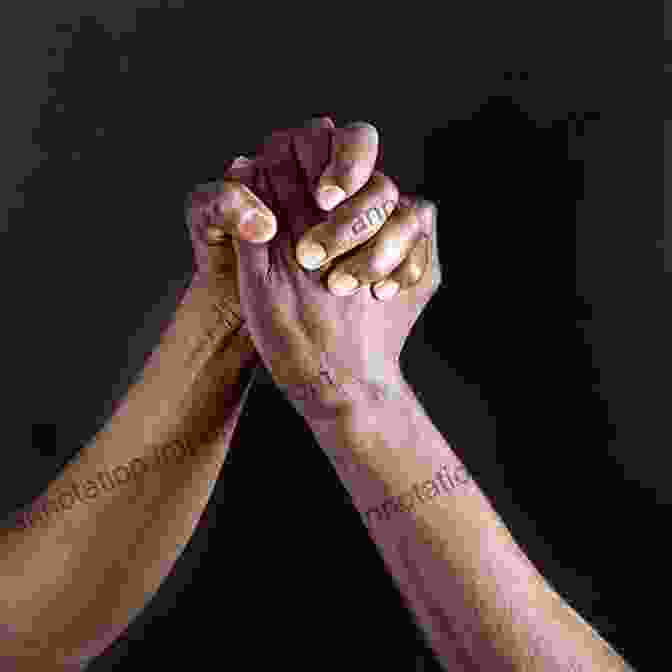 A Serene Image Of Two Hands Clasped Together, Symbolizing The Healing Touch Of Forgiveness The Burden Of Memory The Muse Of Forgiveness (The W E B Du Bois Institute Series)