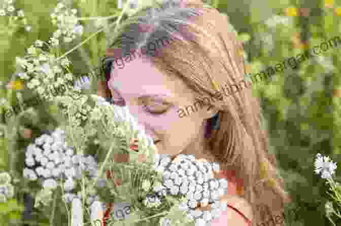 A Woman Smelling A Flower, Her Eyes Closed In Tranquility. The Scent Of Desire: Discovering Our Enigmatic Sense Of Smell