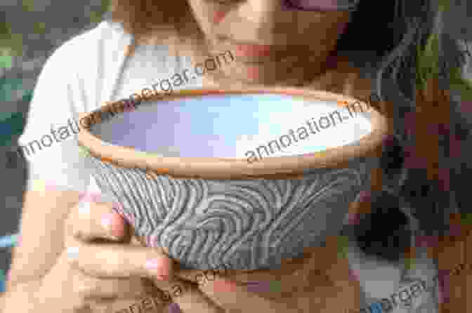 Image Of A Potter Carefully Handling A Ceramic Bowl Ellsworth On Woodturning: How A Master Creates Bowls Pots And Vessels