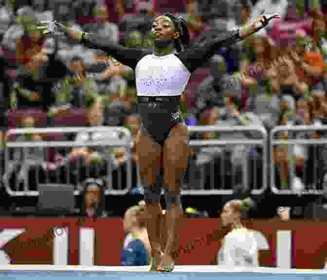 Simone Biles Performing A Breathtaking Gymnastic Routine Guitar Quotes: Inspiration From The World S Best Players